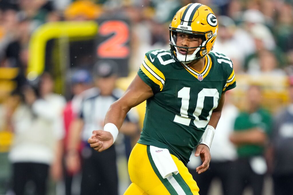 Aug 9, 2025; Green Bay, Wisconsin, USA; Green Bay Packers quarterback Jordan Love (10) watches the ball after handing it off during the first quarter against the New York Jets at Lambeau Field. Mandatory Credit: Kayla Wolf-Imagn Images
